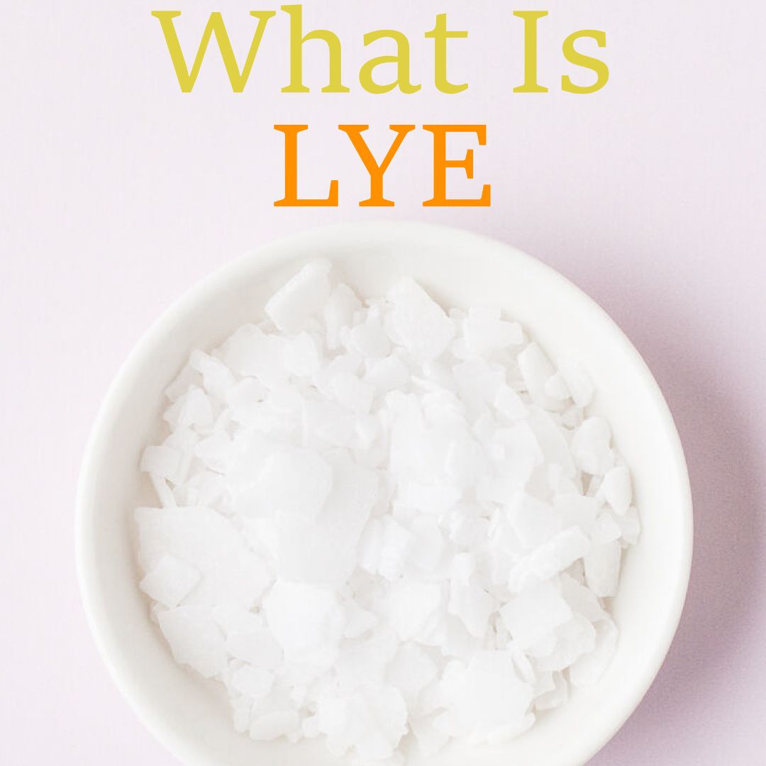 Close-up image of a white bowl filled with lye flakes, with the text 'What Is Lye' in large, colorful letters above.